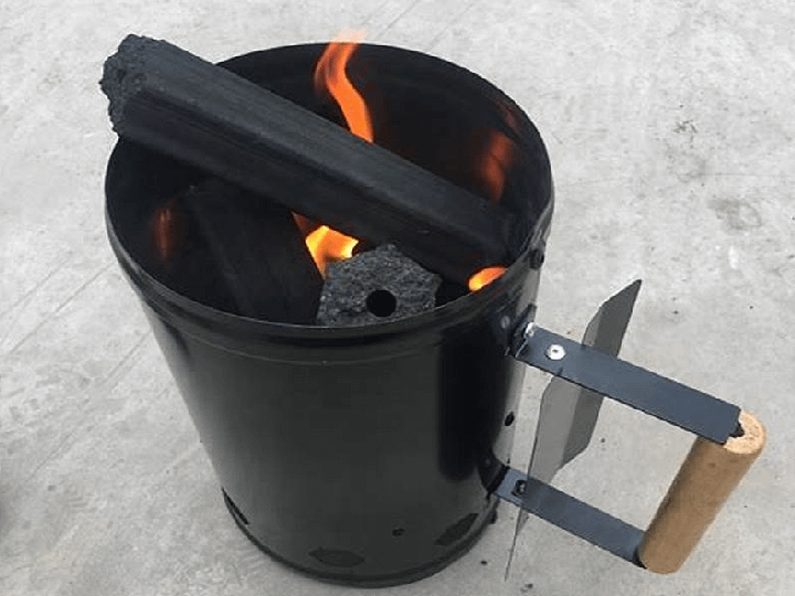 kindling barrel ignites charcoal